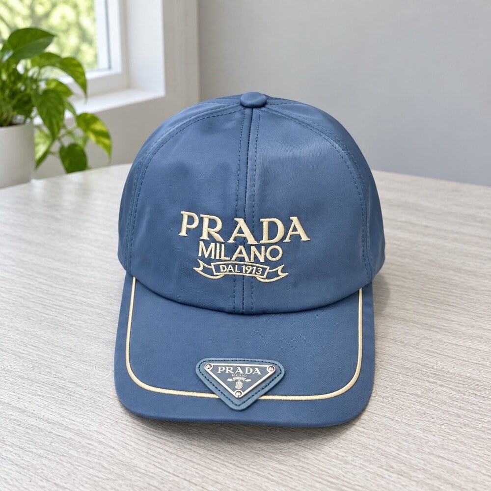 Prada Blue Cap with Cream Embroidery